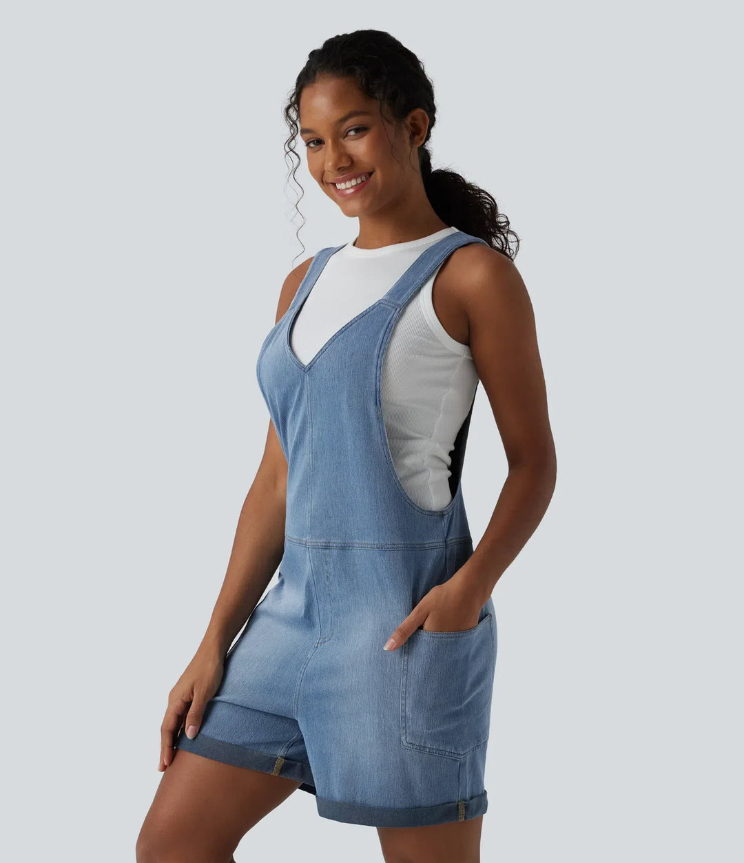Lyckera Flex V-ringad upprullad fåll tvättad denim vardaglig kort overall med fickor