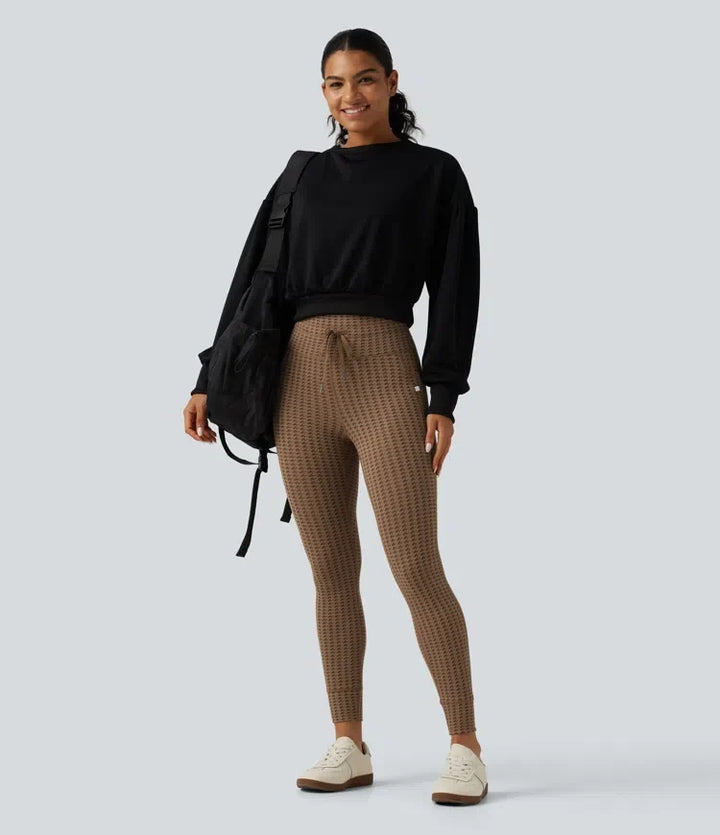 Med hög midja dragsko hundtandsmönstrad yogaleggings med fickor
