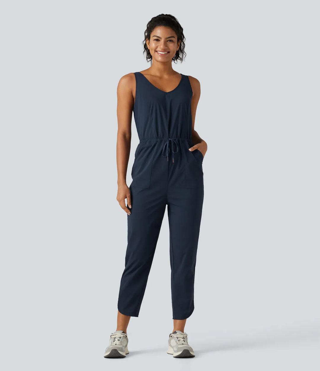 V-ringad dragsko rundad fåll vandring jumpsuit med fickor