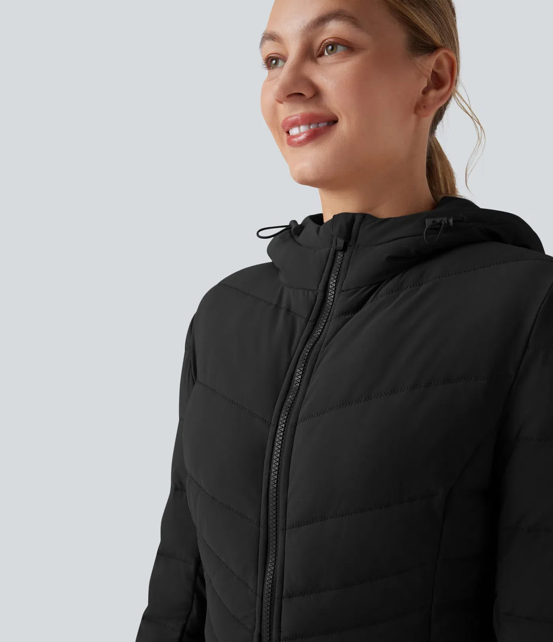 PuffFlex med huva lång modell stretchig vardaglig vadderad jacka med fickor