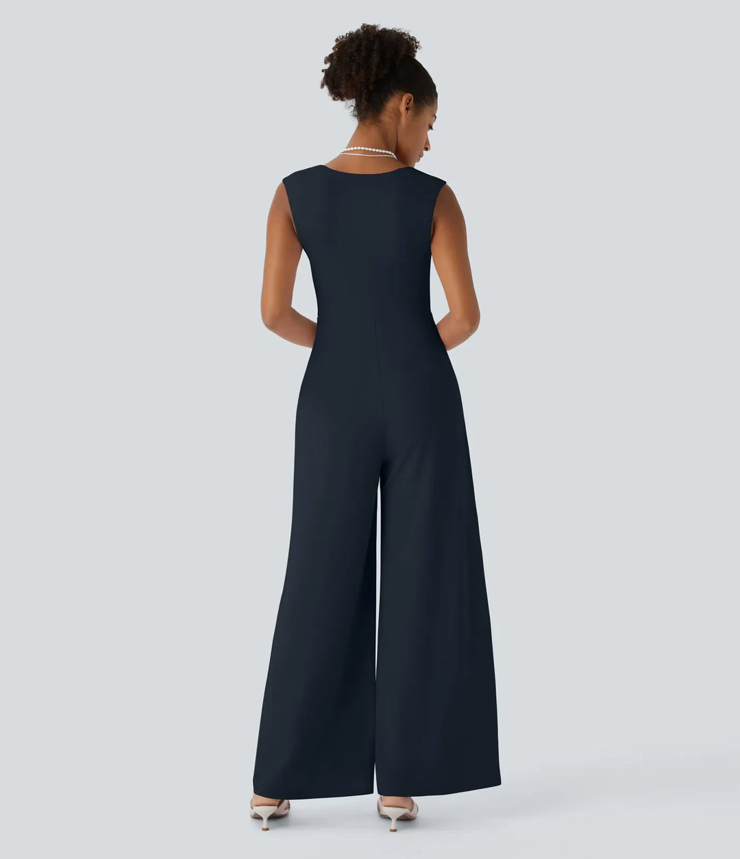 Fyrkantig halsringning ärmlös jumpsuit