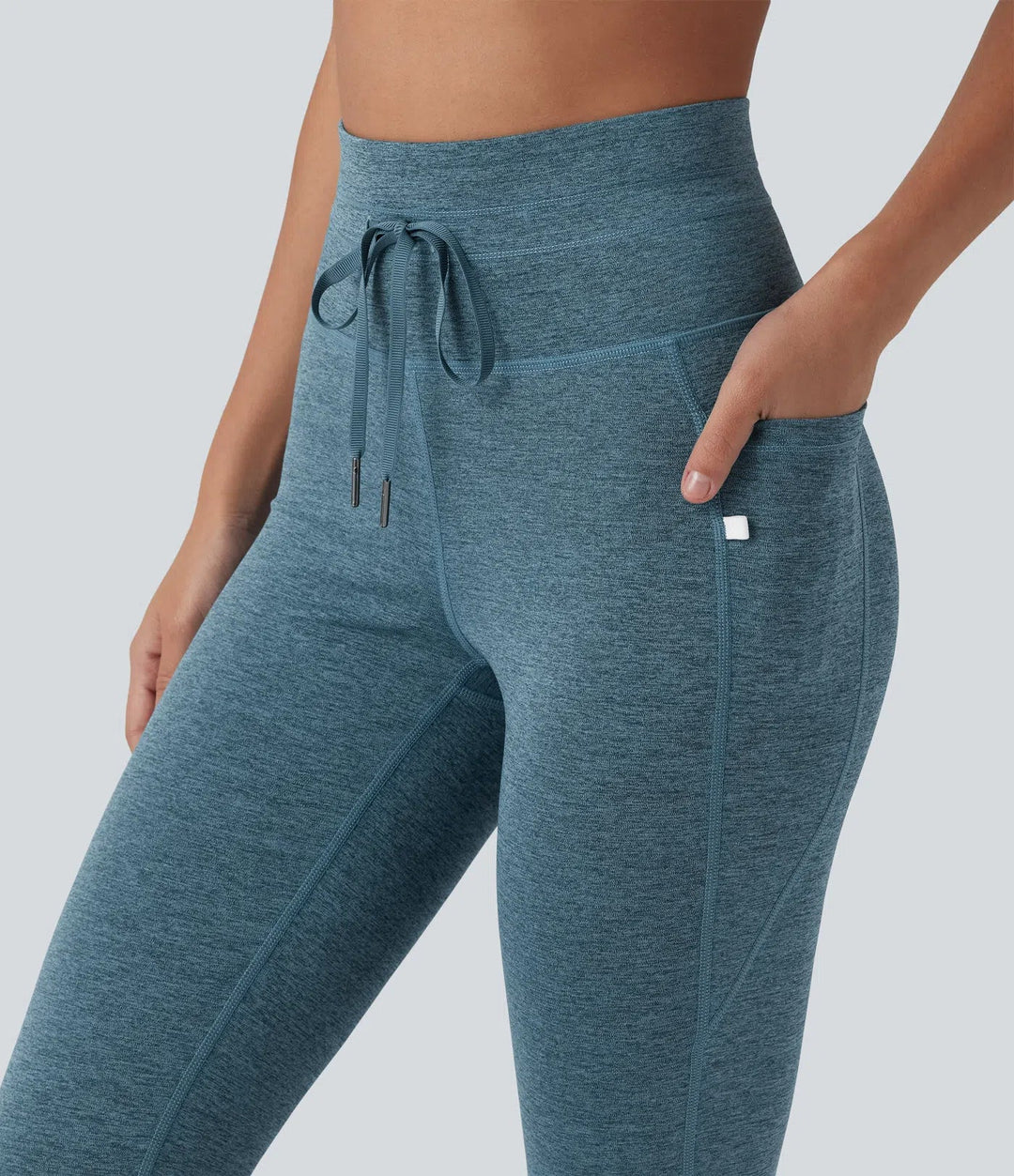 Halara UltraSculpt melerad med hög midja dragsko snabbtorkande yoga 7/8 leggings med fickor