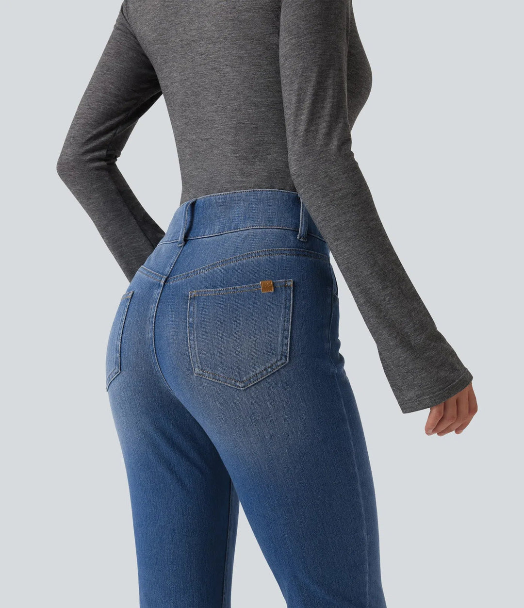 Lyckera Flex medelhög midja asymmetrisk vardaglig skinny jeans med fickor