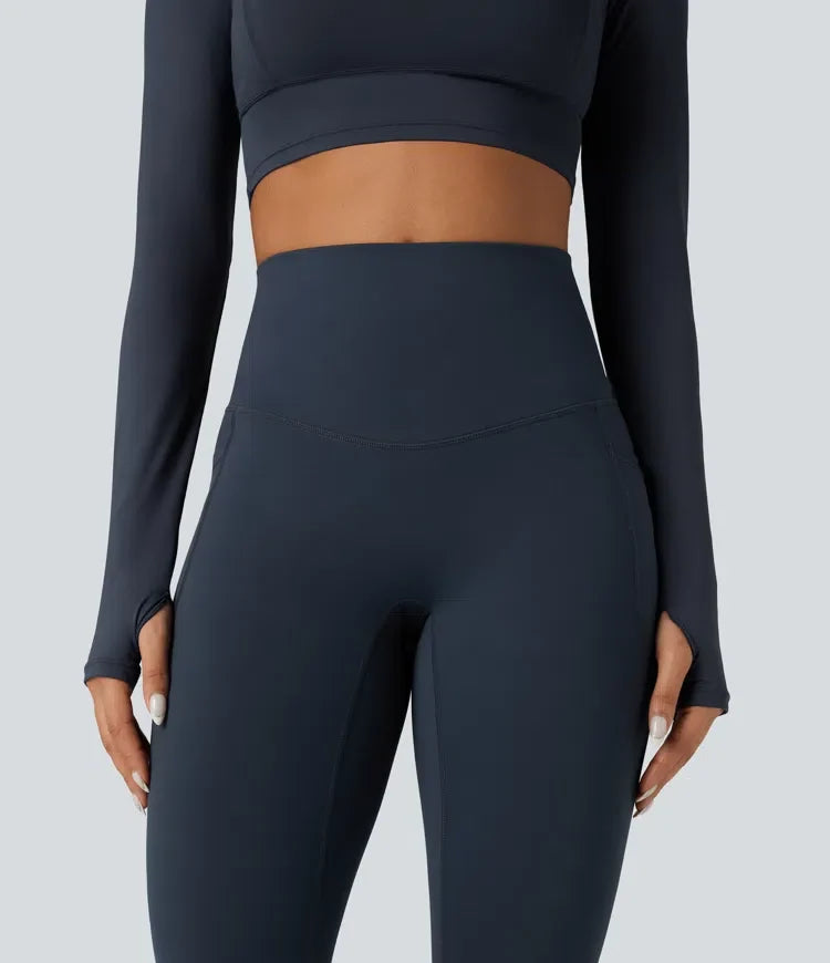 Halara Ultrasculpt Heat med hög midja och magkontroll omlott bak fleece löparleggings med fickor
