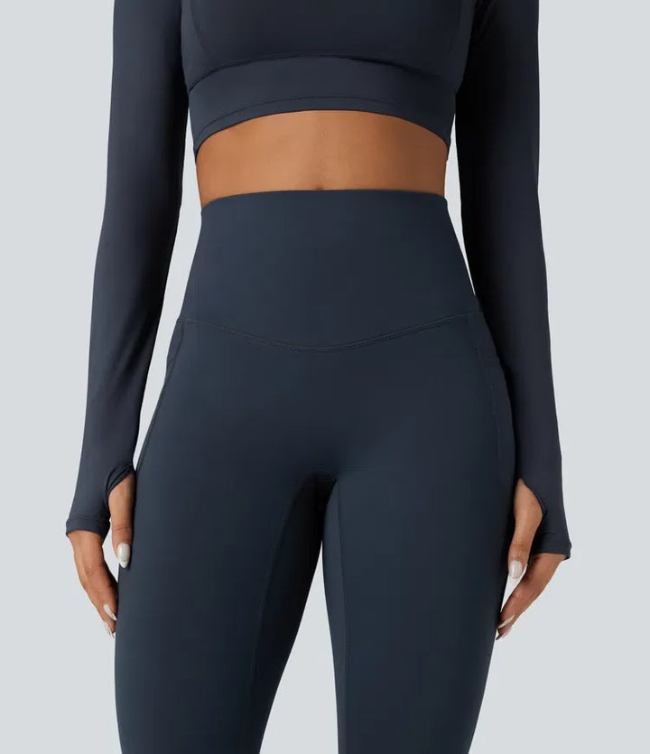 Halara Ultrasculpt Heat med hög midja och magkontroll omlott bak fleece löparleggings med fickor