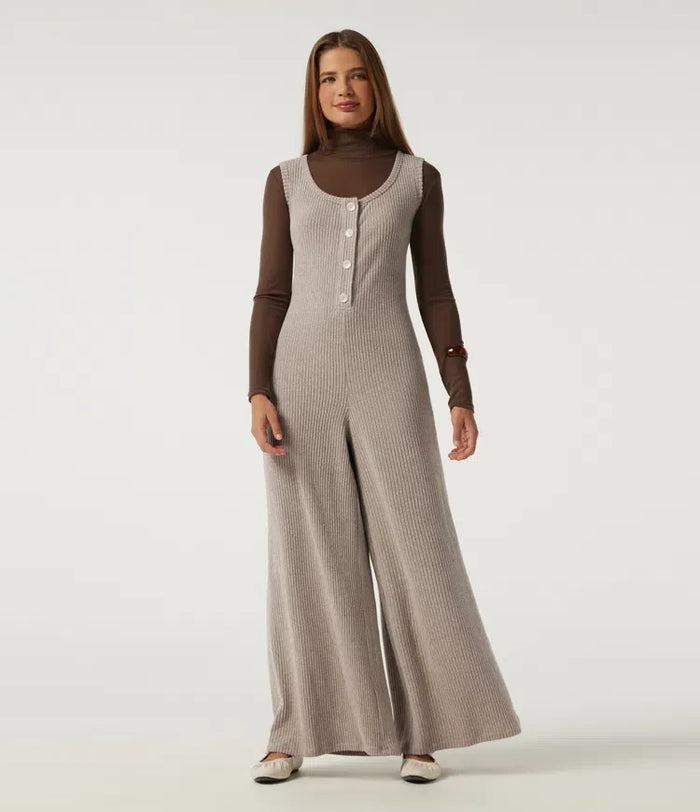 Ribbstickad U-ringad vida ben vardaglig jumpsuit med fickor
