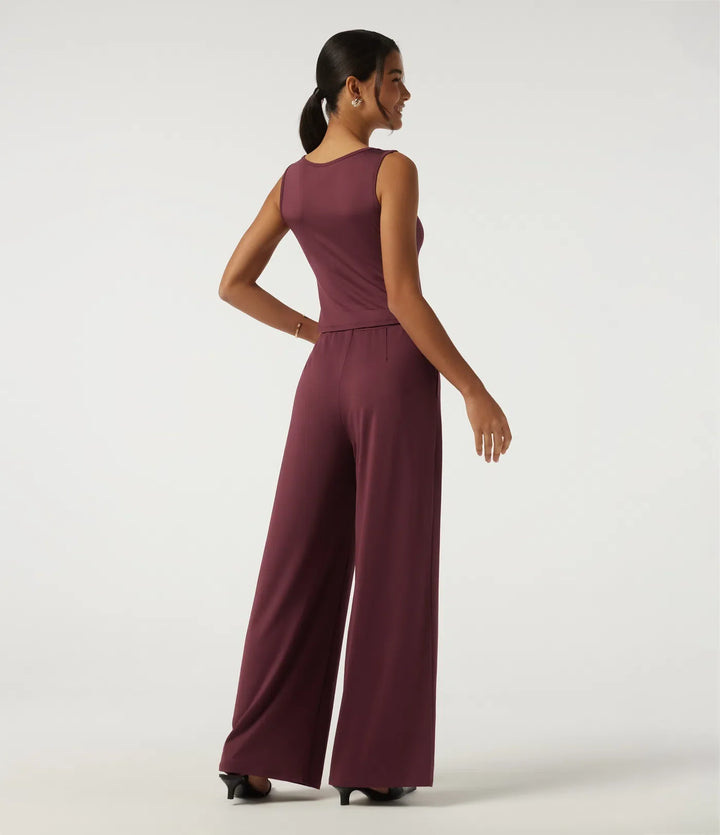 Rund hals ärmlös smal vida ben asymmetrisk jumpsuits för fest med fickor -Easy Peezy Edition