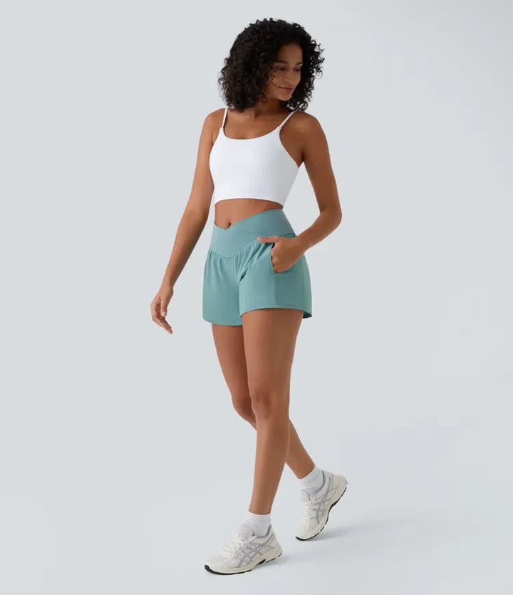 Breezeful med hög midja, omlottmidja och ficka 2-i-1 snabbtorkande yogashorts 4"
