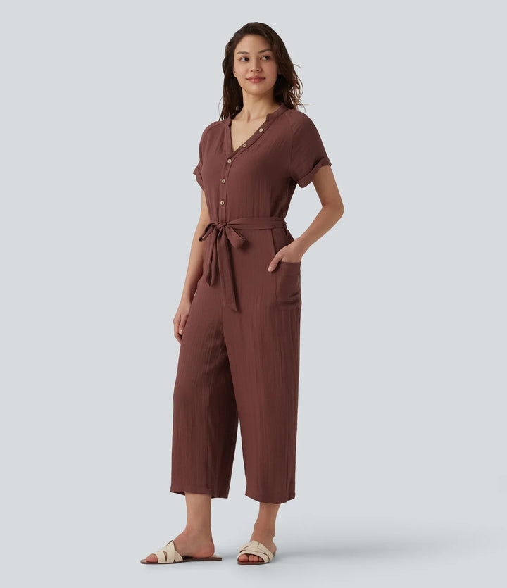 V-ringad kortärmad bältad croppad vardaglig baggy jumpsuit med fickor