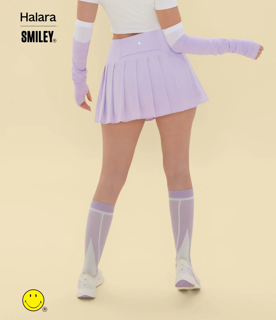 Halara X Smiley® Breezeful med hög midja plisserad 2-i-1 asymmetrisk fåll snabbtorkande mini danskjol med fickor