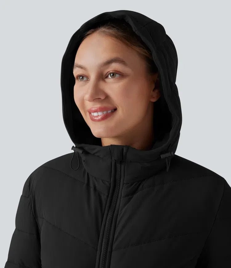 PuffFlex med huva lång modell stretchig vardaglig vadderad jacka med fickor
