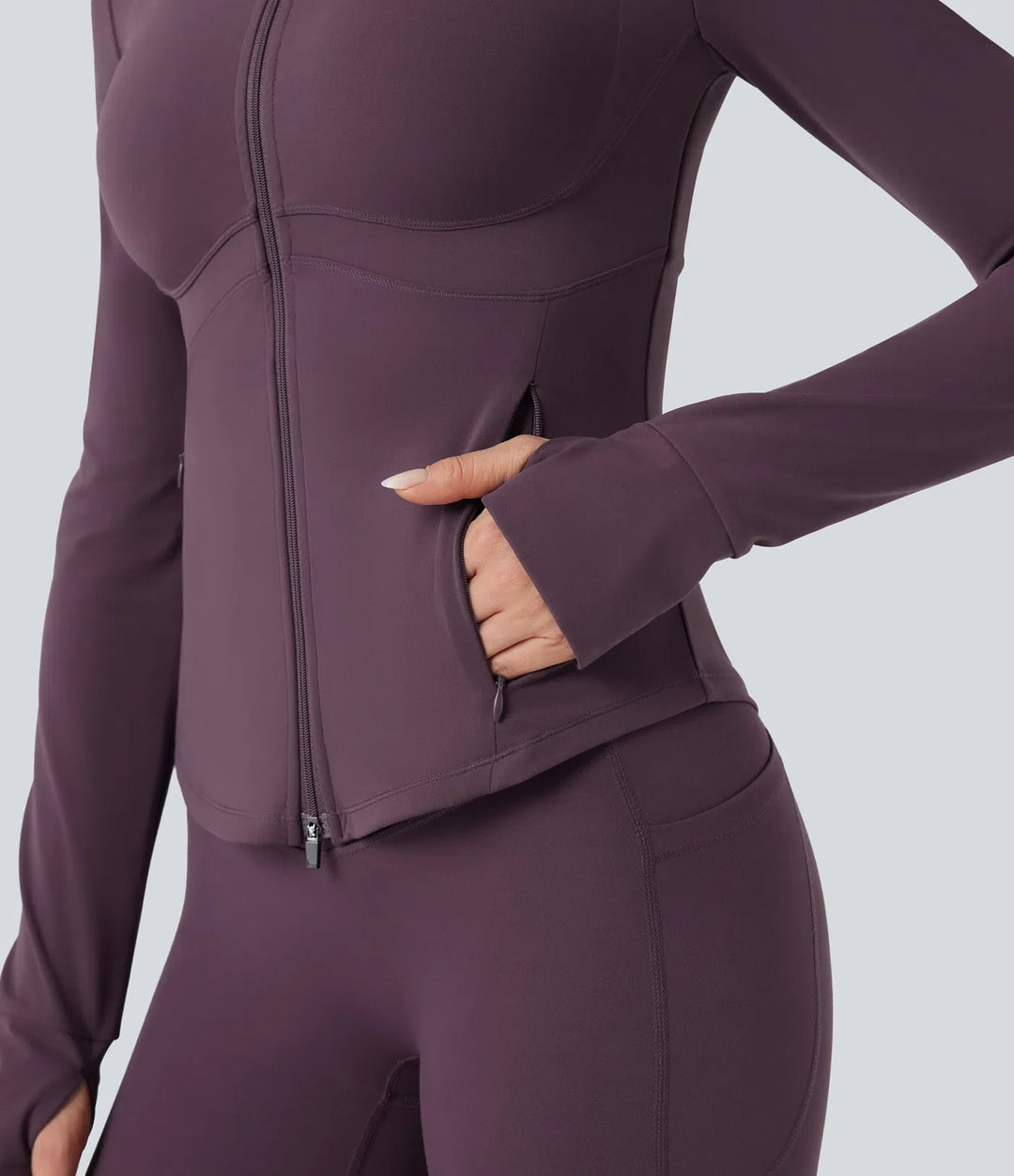 Lyckera UltraSculpt halvpolo push-upp långärmad tumhål yogajacka med fickor