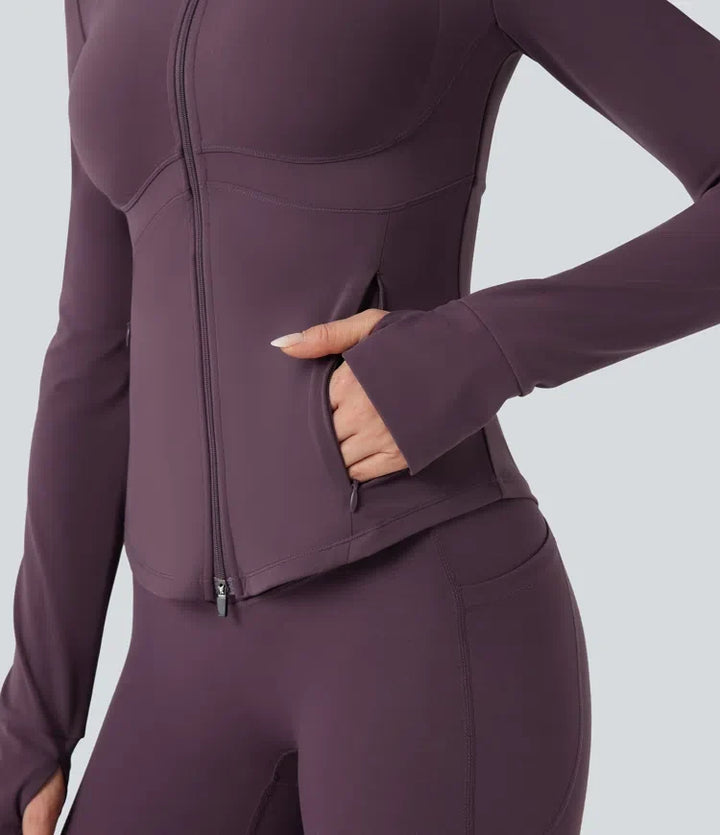Lyckera UltraSculpt halvpolo push-upp långärmad tumhål yogajacka med fickor