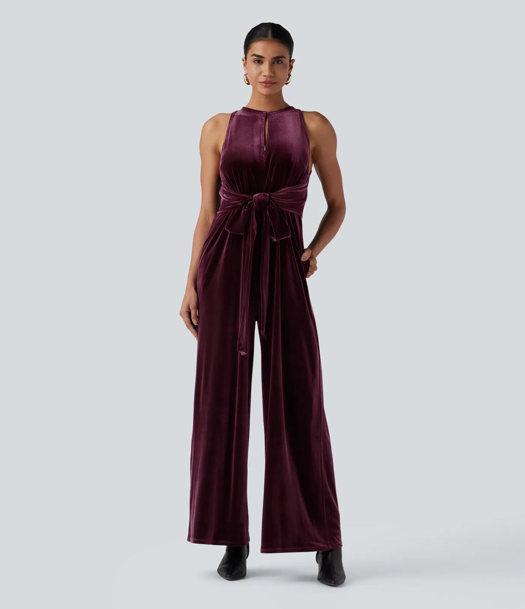 Rund hals ärmlös knytning i ryggen sammet fest jumpsuit med fickor