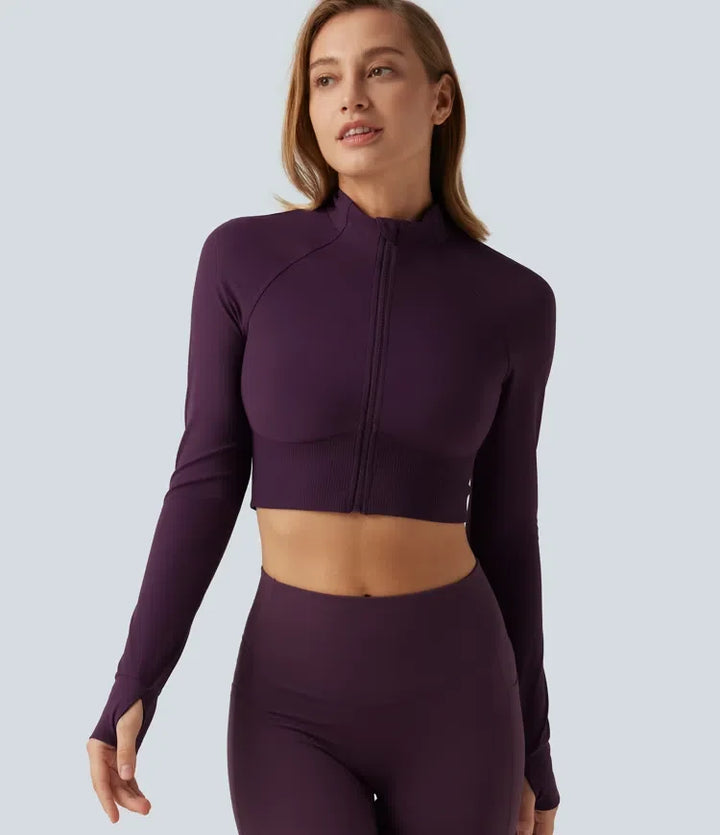 Lyckera UltraSculpt halvpolo lång raglanärm tumhål croppad yogajacka