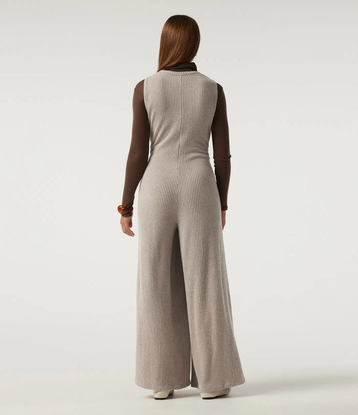 Ribbstickad U-ringad vida ben vardaglig jumpsuit med fickor