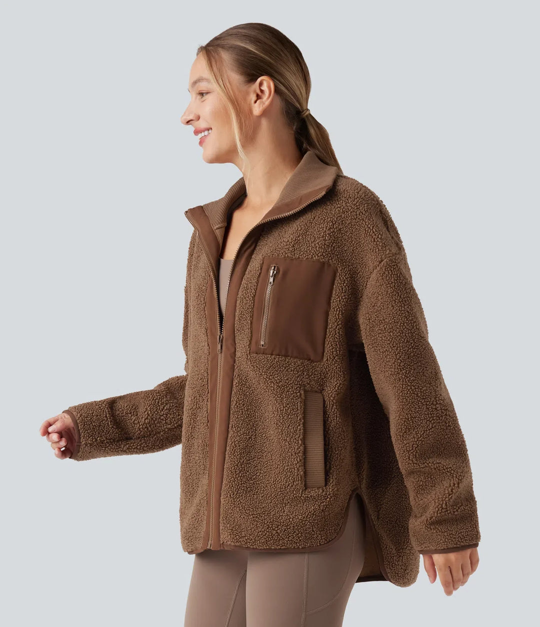 Långärmad hög-låg rundad fåll träning sherpajacka med fickor