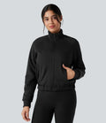 Vändbar hög hals långärmad fleece vandringsjacka med fickor (två looks i en)