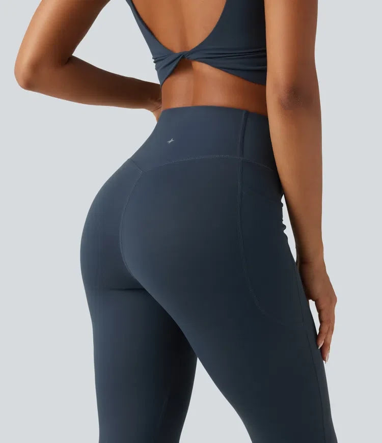 Halara UltraSculpt med hög midja omlott magkontroll utsvängd träningsleggings med fickor