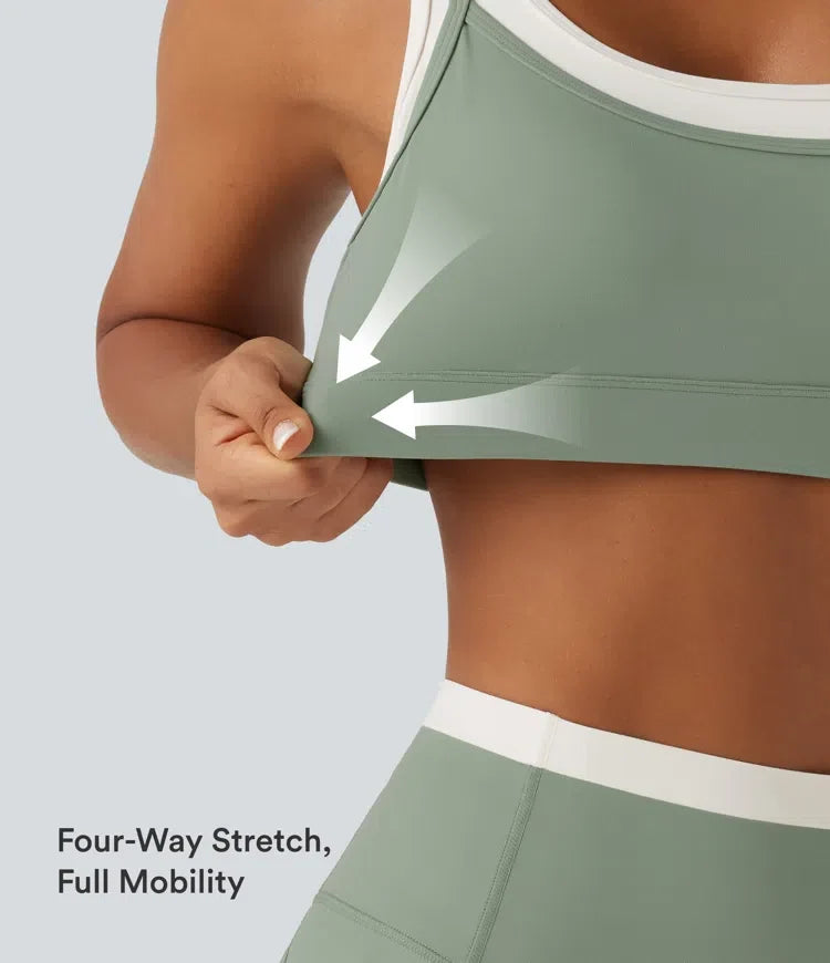 Lyckera UltraSculpt medium stöd U-ringad inbyggd BH vriden färgblock yoga sport-BH