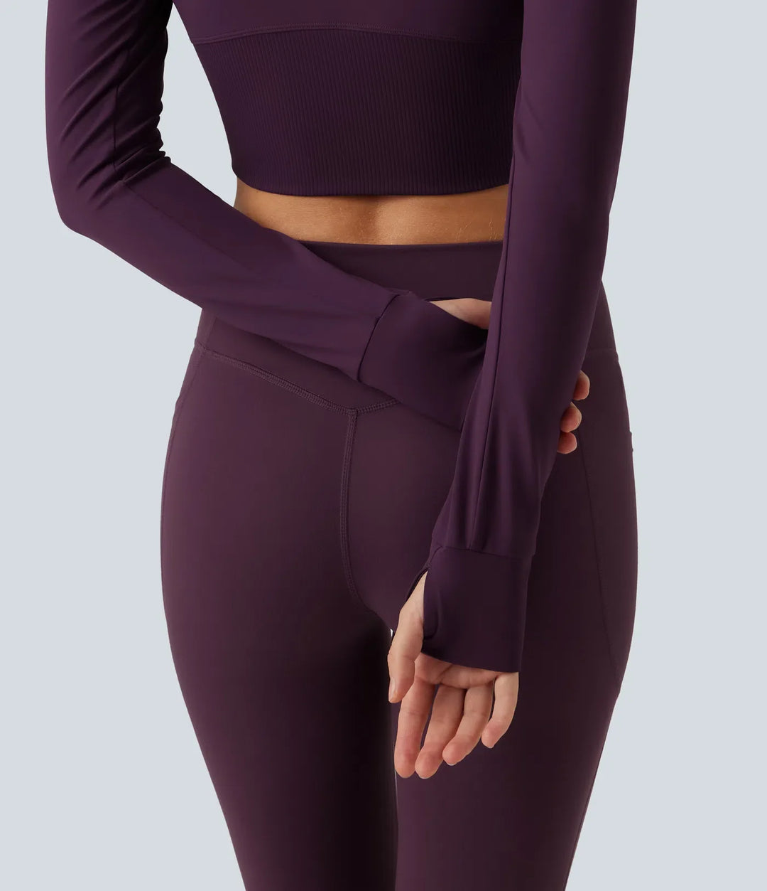 Lyckera UltraSculpt halvpolo lång raglanärm tumhål croppad yogajacka