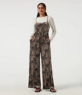 U-ringad ärmlös leopardmönster sammet vardaglig jumpsuit med fickor