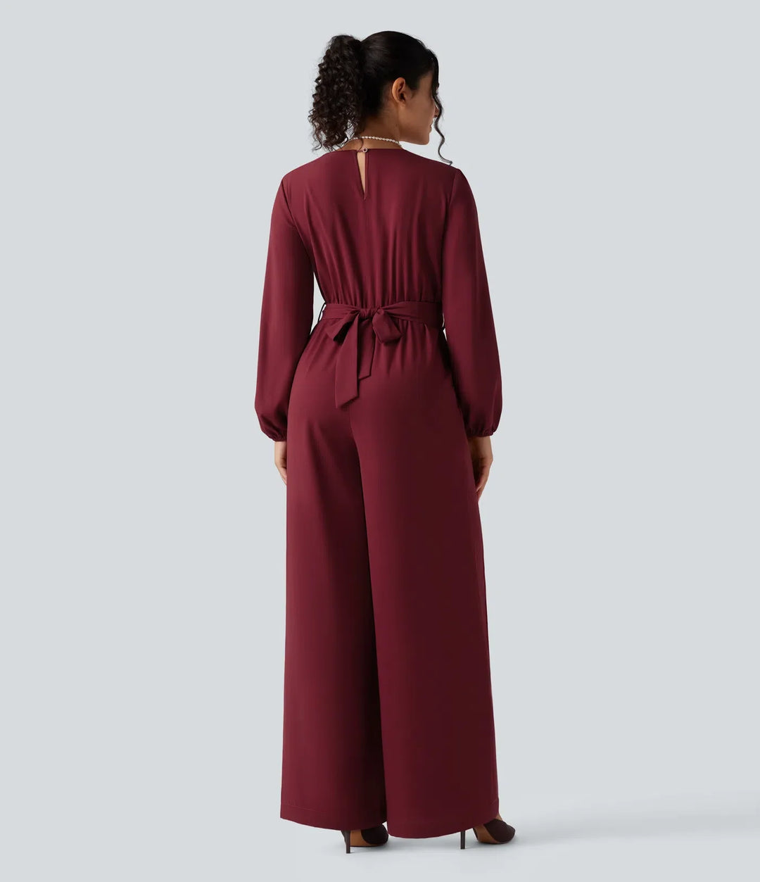 V-ringad lång puffärm bältad vida ben fest jumpsuit med fickor