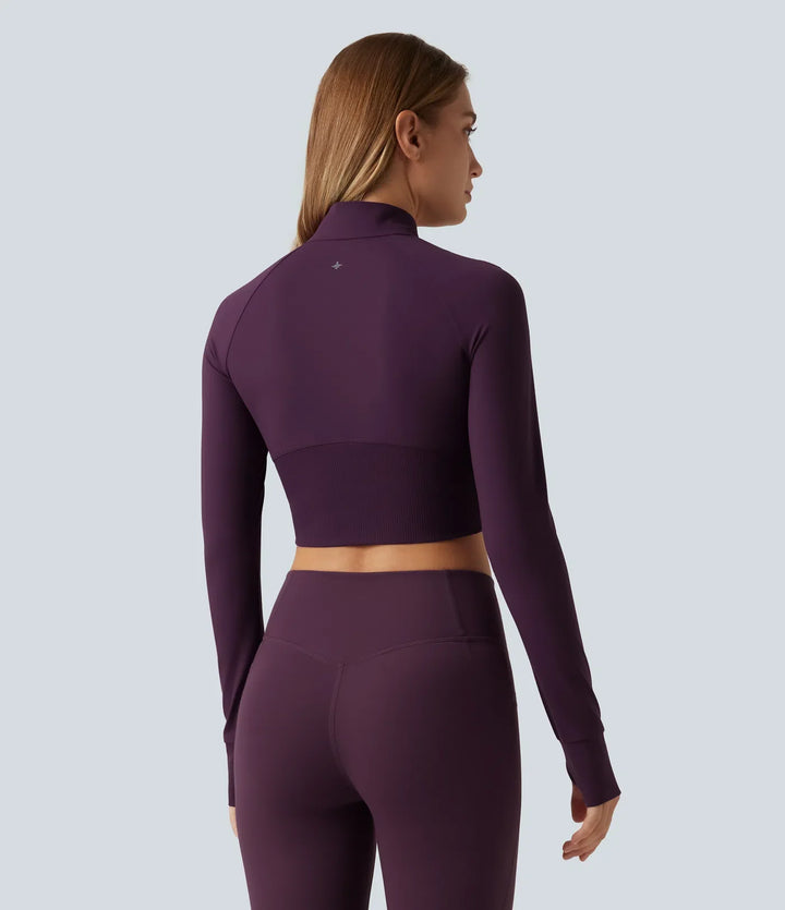 Lyckera UltraSculpt halvpolo lång raglanärm tumhål croppad yogajacka