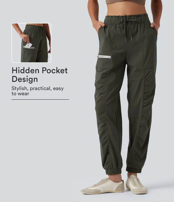 Med medelhög midja dragsko rynklad avsmalnande snabbtorkande InstantCool löpning joggingbyxor med fickor – UPF40+
