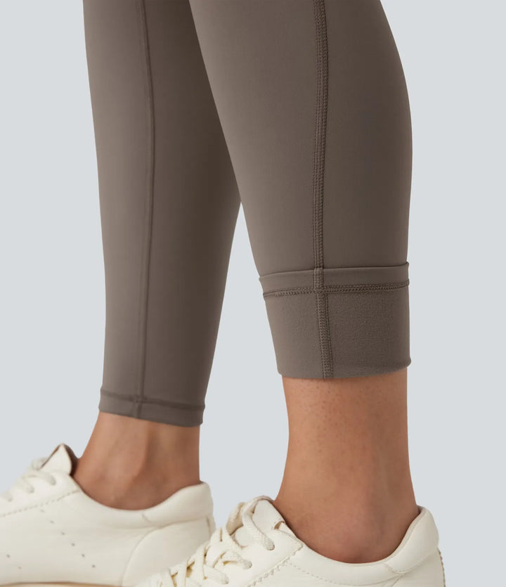 Halara Ultrasculpt Heat med hög midja och magkontroll fleece yogaleggings med fickor