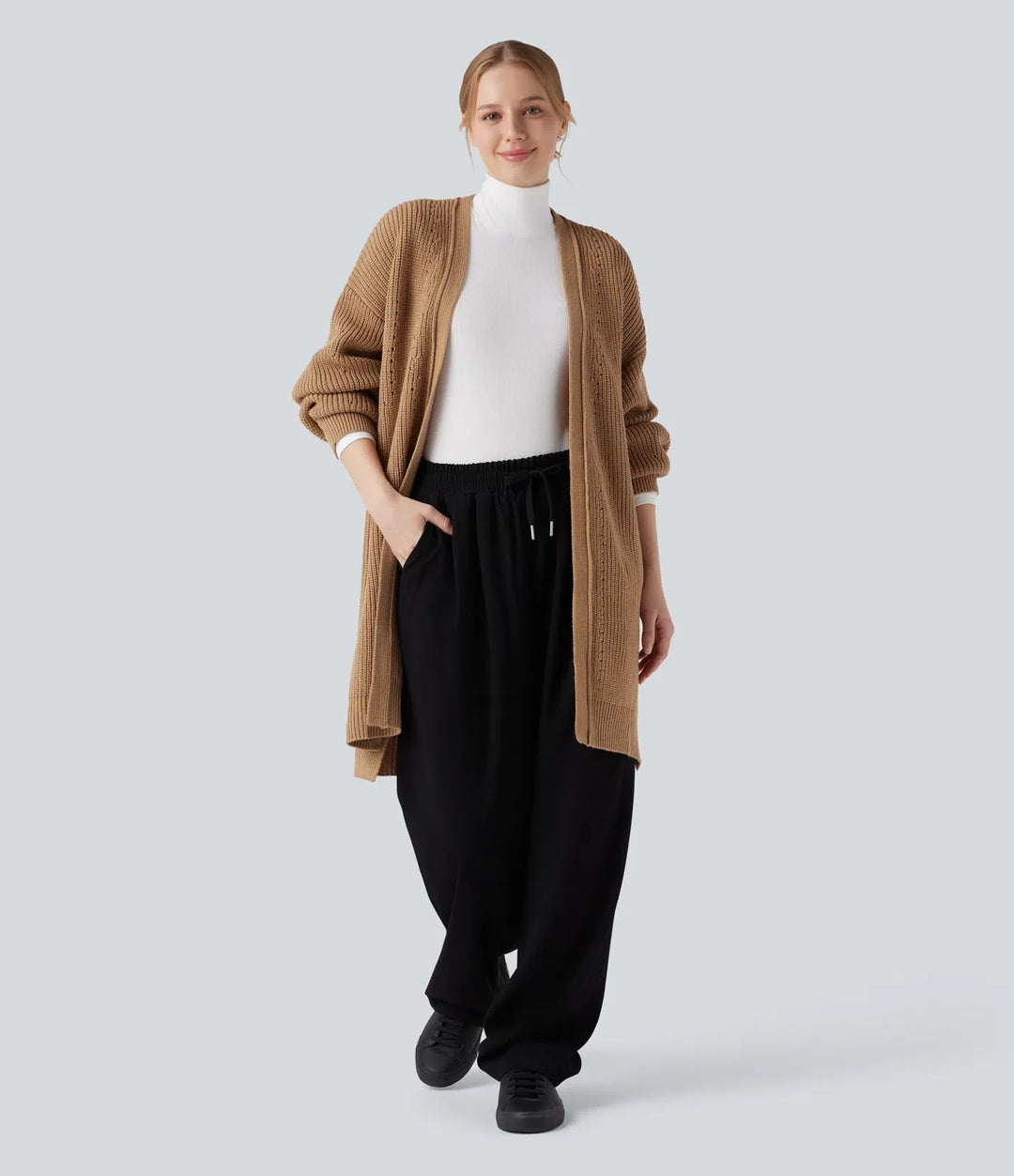 Lång bishopärm slits fåll hålmönstrad vardaglig lång modell cardigan