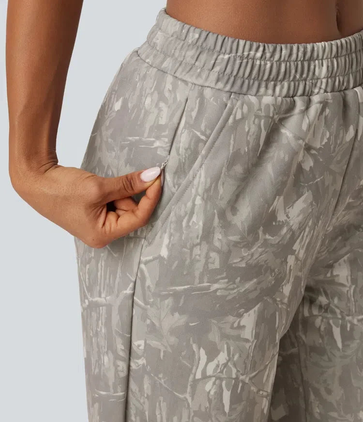 Medelhög midja raka ben mönstrad inner dragsko fleece vardaglig mjukisbyxor med fickor