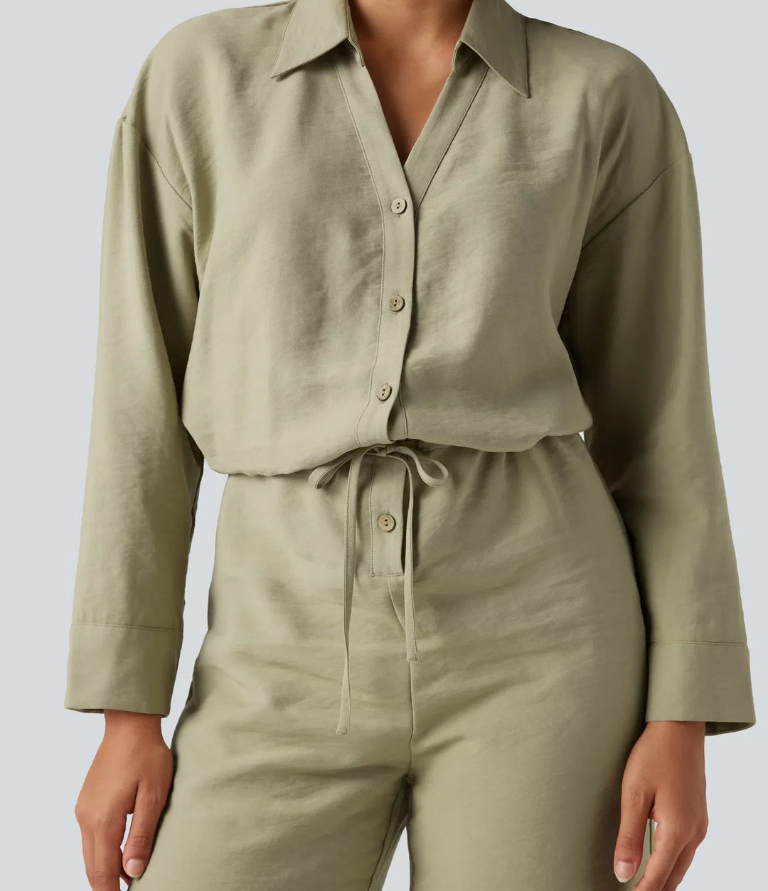 Långärmad dragsko vida ben arbetsjumpsuit med fickor