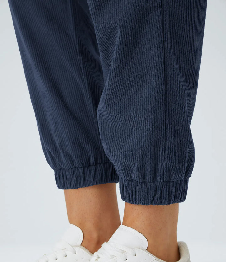 Medelhög midja dragkedja fickor manchester vardaglig joggers