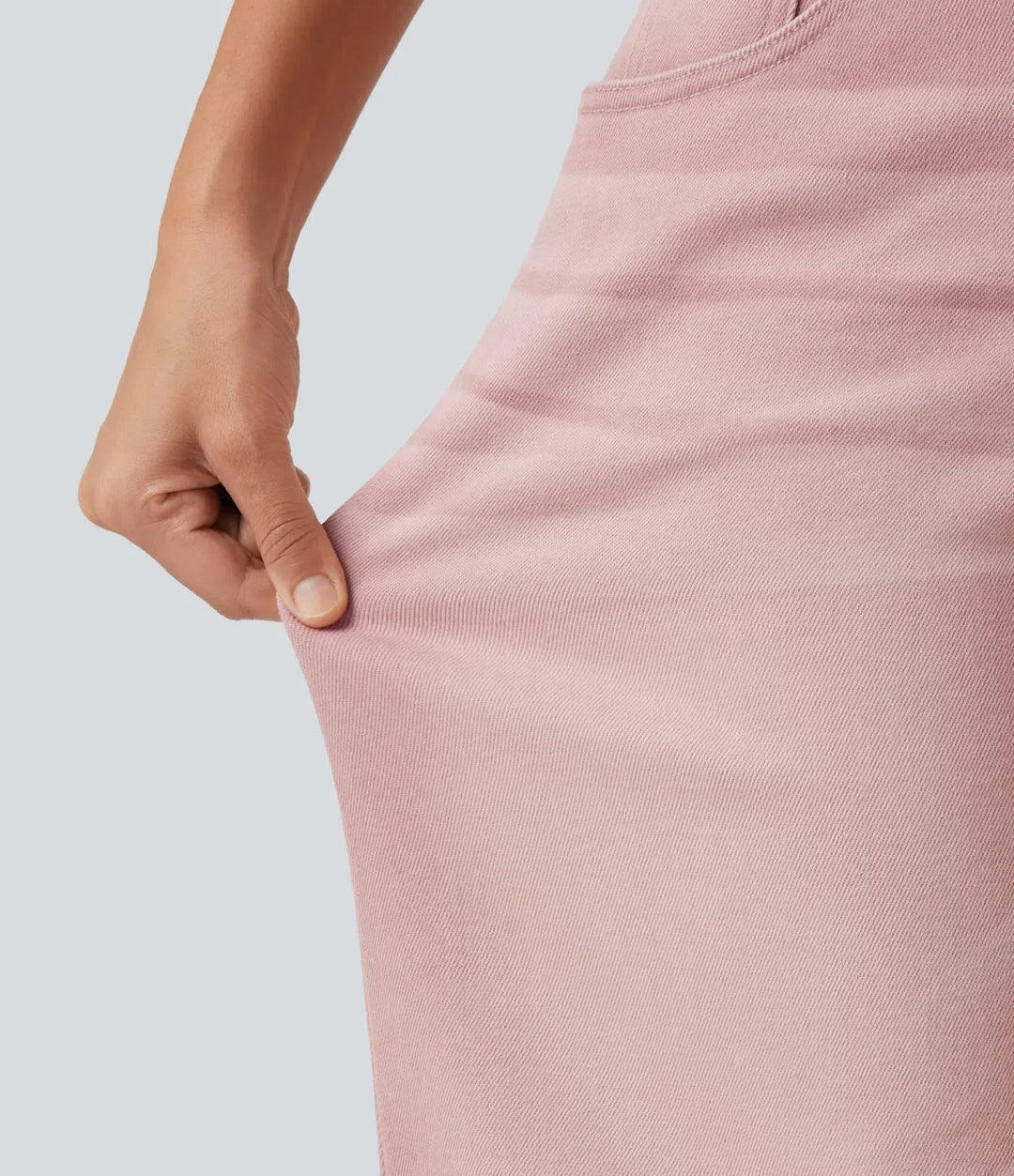 Med låg midja asymmetrisk vida ben färgglad vardagsjeans med fickor