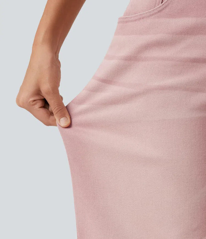 Med låg midja asymmetrisk vida ben färgglad vardagsjeans med fickor