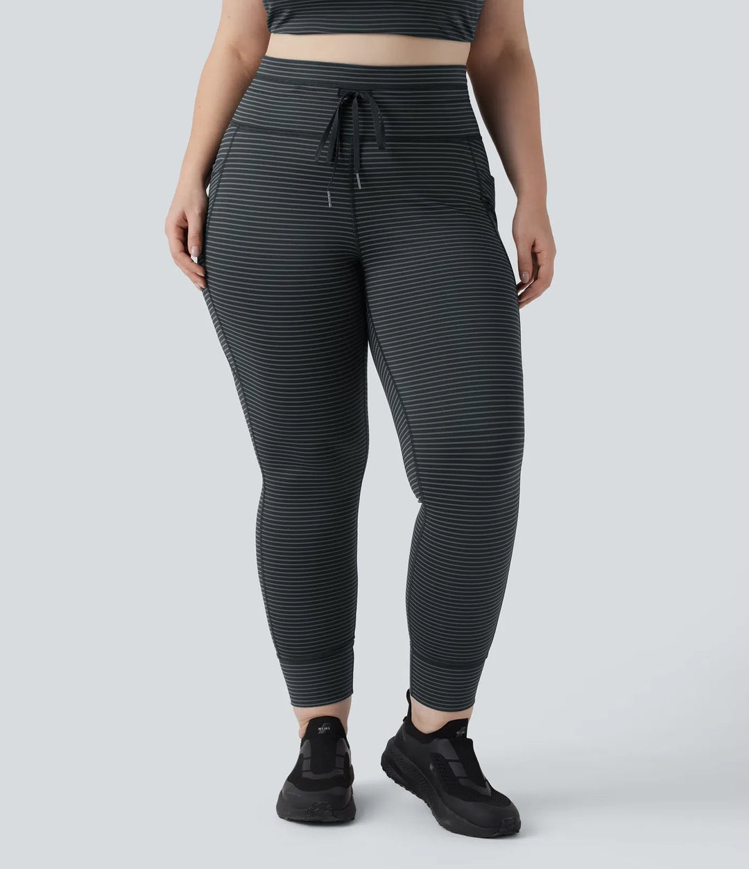 Med hög midja dragsko randig yoga leggings i plusstorlek med fickor