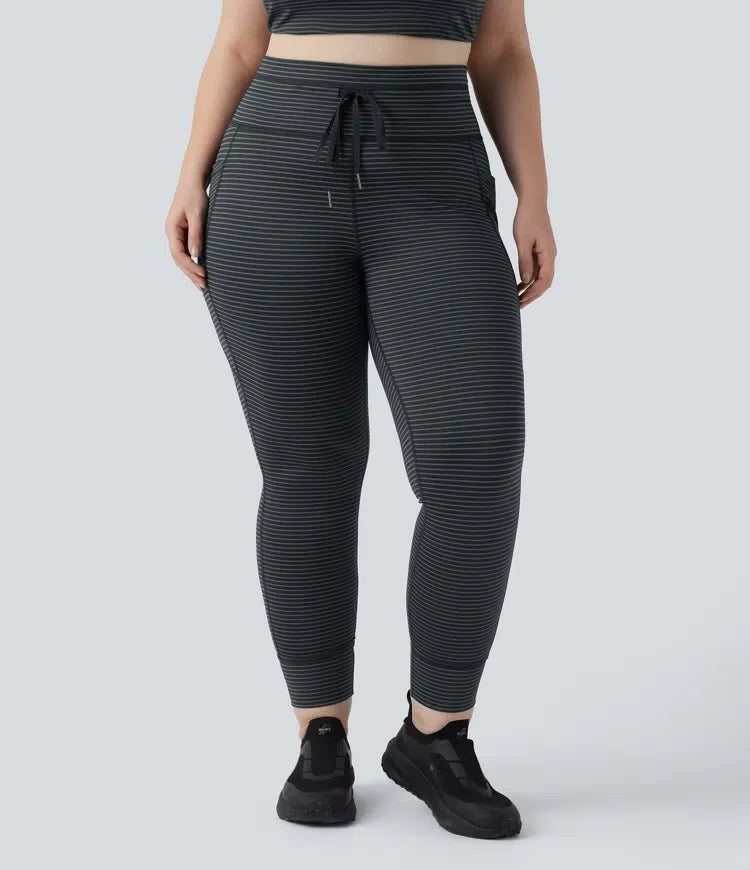 Med hög midja dragsko randig yoga leggings i plusstorlek med fickor