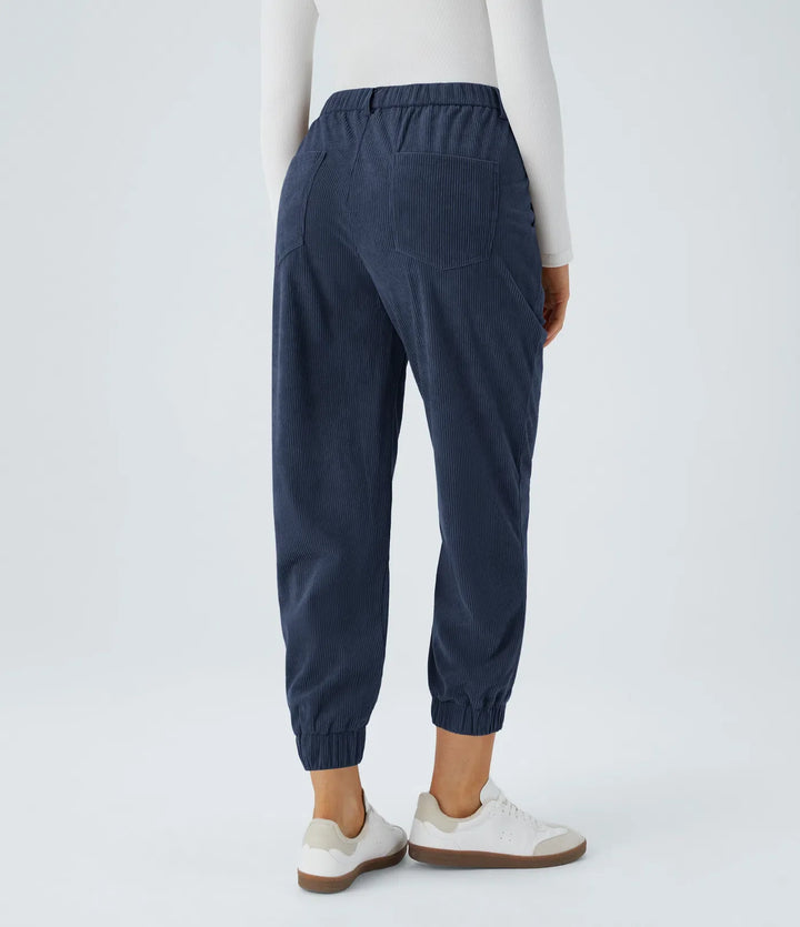 Medelhög midja dragkedja fickor manchester vardaglig joggers