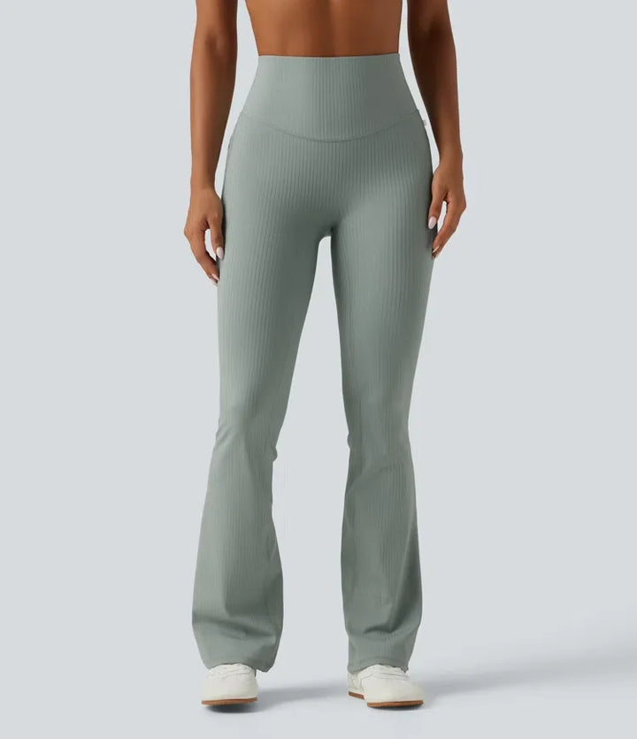Ribbstickad med hög midja och magkontroll bootcut träningsleggings med fickor