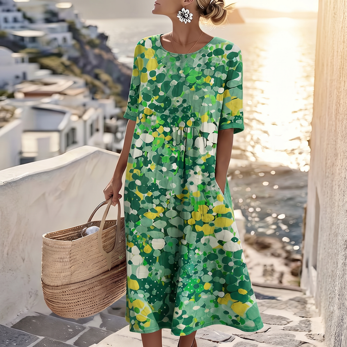CLOVERLEIGH LÖST KLÄNNING MED BLOMMIG PRESENTER